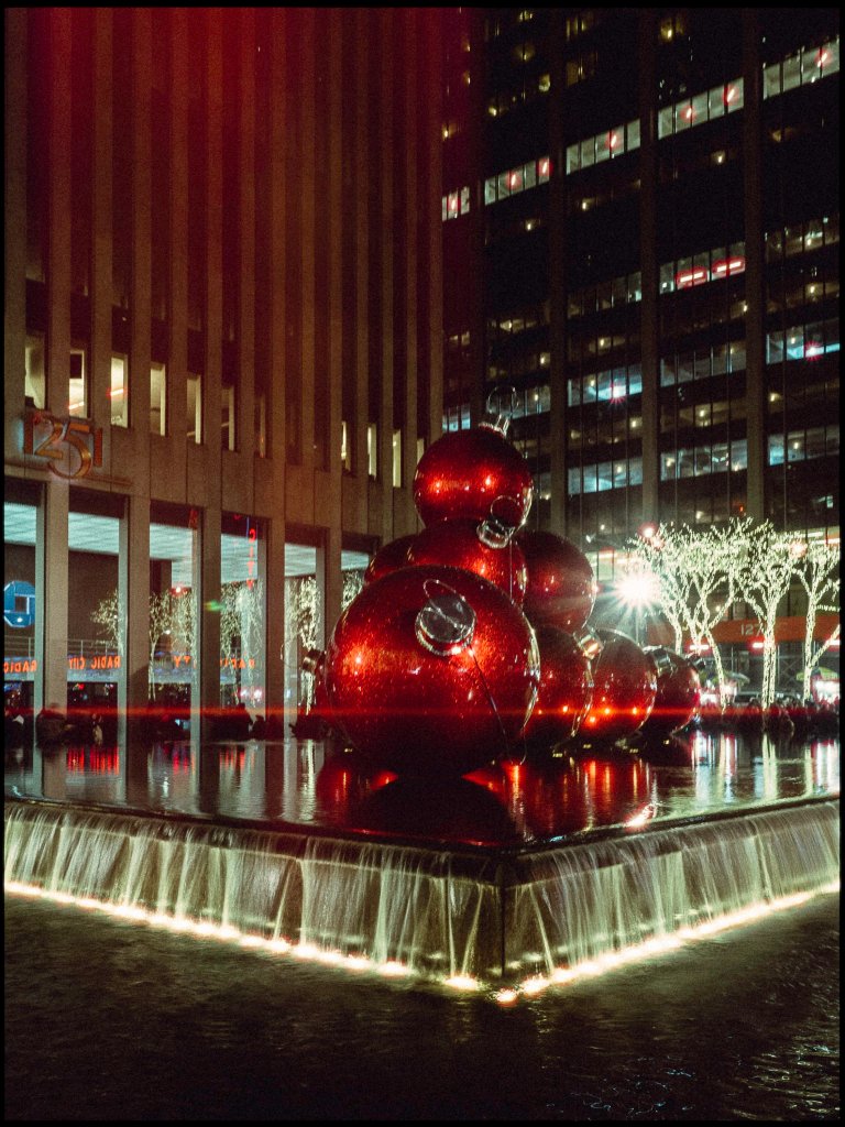 A photo of large festive baubles outside an office block in Manhattan