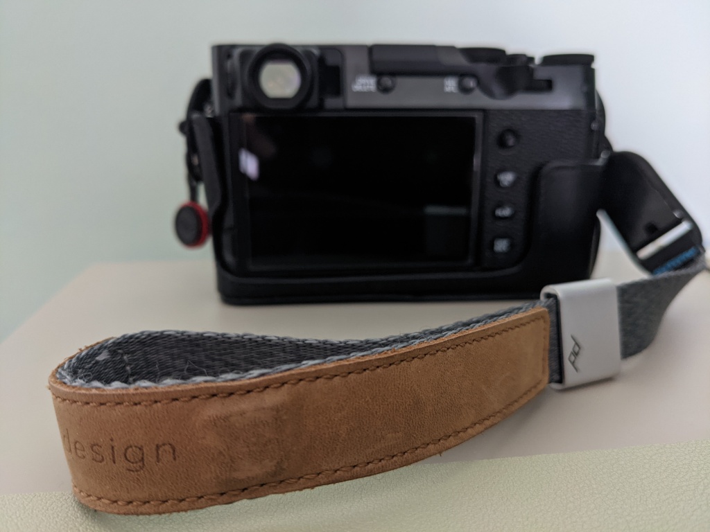 A photo of the wrist strap attached to my camera